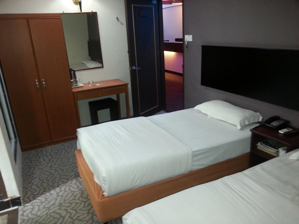Oriental Inn Кучинг Номер фото