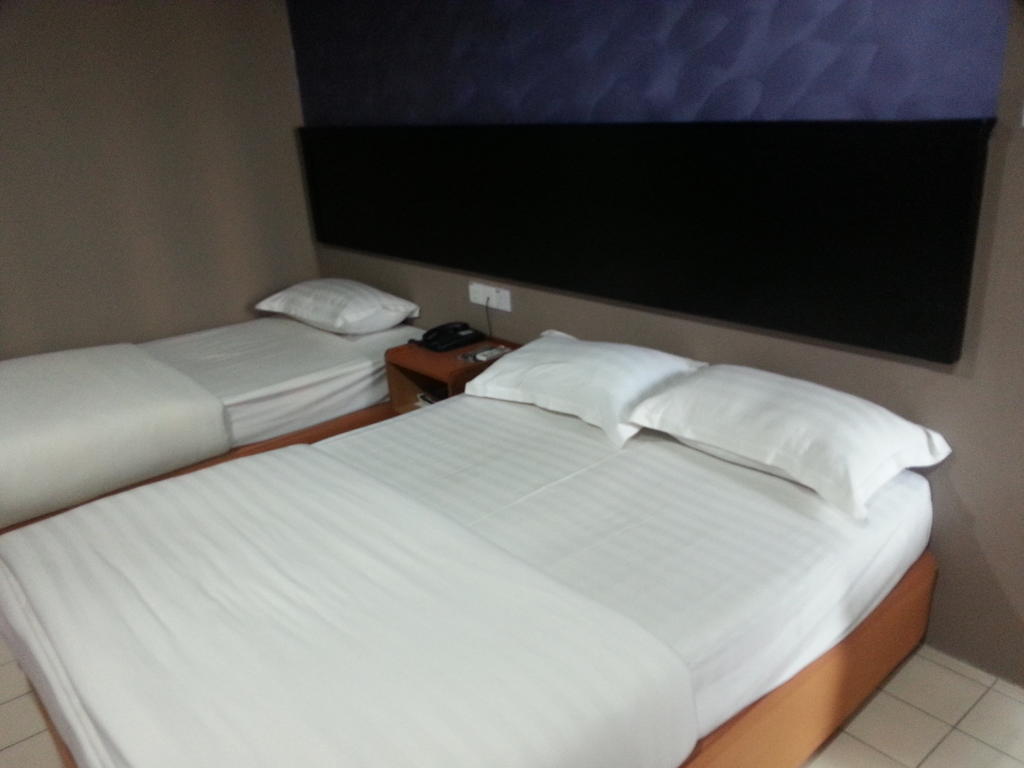 Oriental Inn Кучинг Номер фото