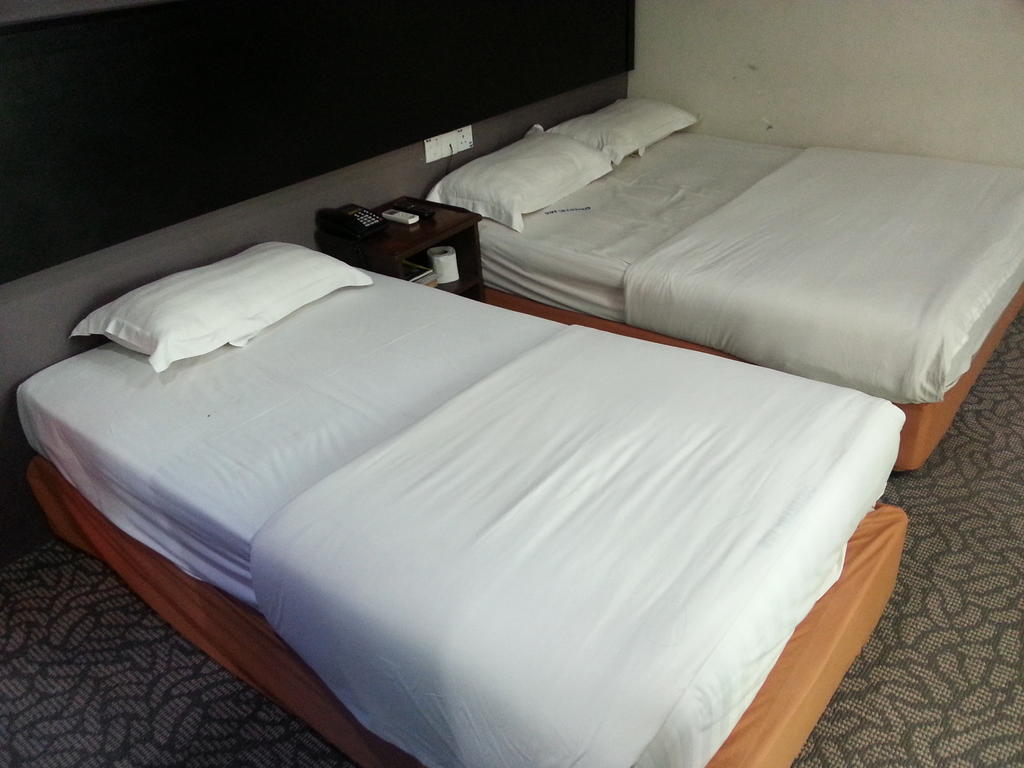 Oriental Inn Кучинг Номер фото