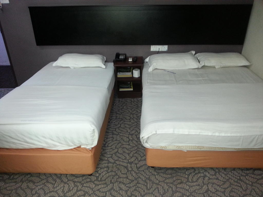 Oriental Inn Кучинг Номер фото